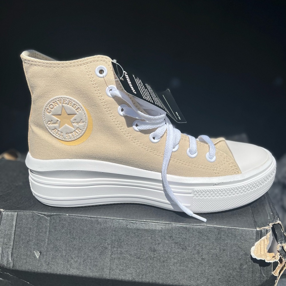 Selling these cute tan platform converse. Never worn.